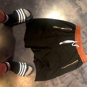 Super cool! black shorts with brown waistband.